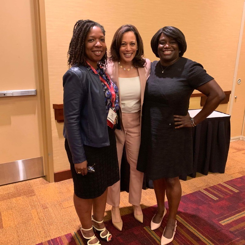 Three attendees at a professional event